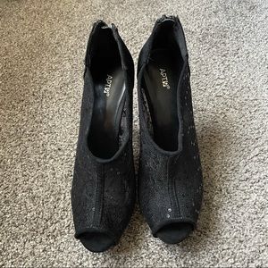 Black peep toe heels